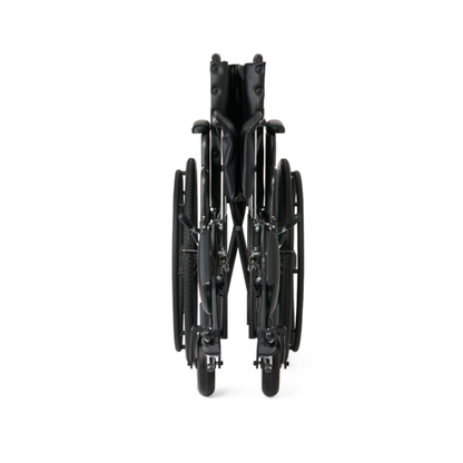 The Medline Guardian Extra-Wide Bariatric Wheelchair is shown folded from the front, with its seat and backrest compressed and wheels close together, showcasing a compact, portable design that supports up to 500 lbs.