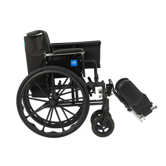 The Medline Lightweight K3 Wheelchair, shown from the side on a white background, features a black folding frame, large rear wheels, elevated leg rests, cushioned seat, and comfortable nylon upholstery.
