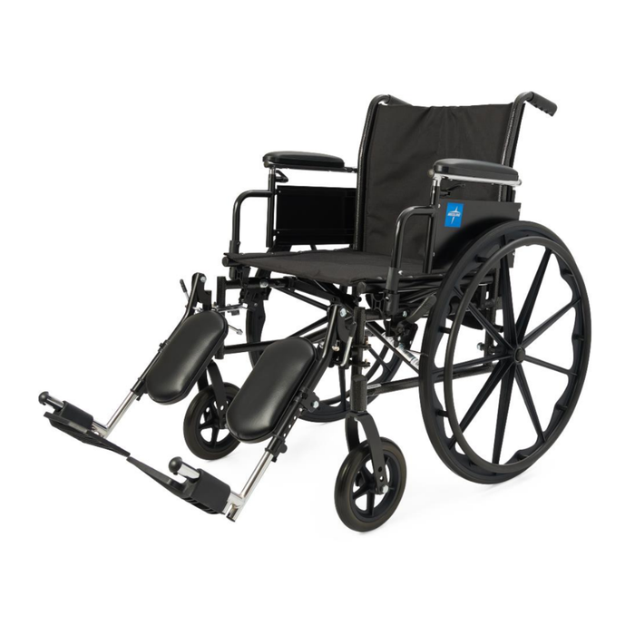 The Medline Lightweight K3 Wheelchair has a black folding frame, large rear and small front wheels, padded armrests, elevated leg rests, durable nylon upholstery, and a blue medical cross on the armrest panel.