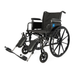 The Medline Lightweight K3 Wheelchair has a black folding frame, large rear and small front wheels, padded armrests, elevated leg rests, durable nylon upholstery, and a blue medical cross on the armrest panel.