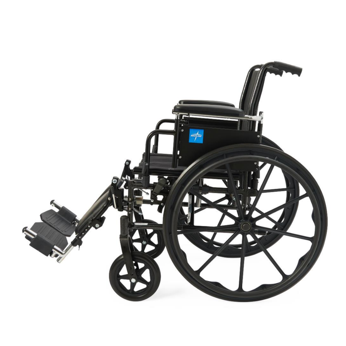 The Medline Lightweight K3 Wheelchair, shown from the side against a white background, features a black lightweight frame, large rear wheels, extended footrests, padded armrests, and durable nylon upholstery.