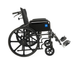 The Medline Guardian Reclining Wheelchair, black with durable vinyl upholstery, large rear wheels, small front wheels, footrests, and armrests, is shown from the side against a white background.