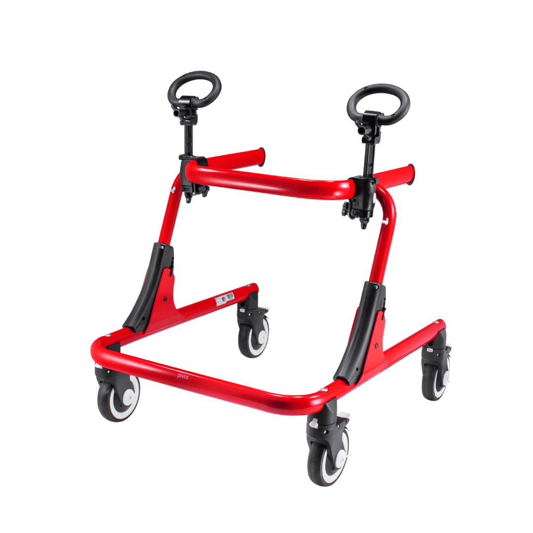 A Hand Loop For Pivot Gait Trainer is shown on a bright red pediatric posterior walker with four black swivel wheels and two adjustable arm supports with circular hand grips, all set against a white background.