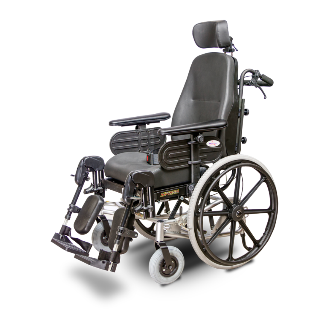 The Heartway Spring Tilt N Space Reclining Manual Wheelchair, in black and silver, features large rear wheels, elevated leg rests, padded armrests, and an adjustable headrest. Photographed on a white background.