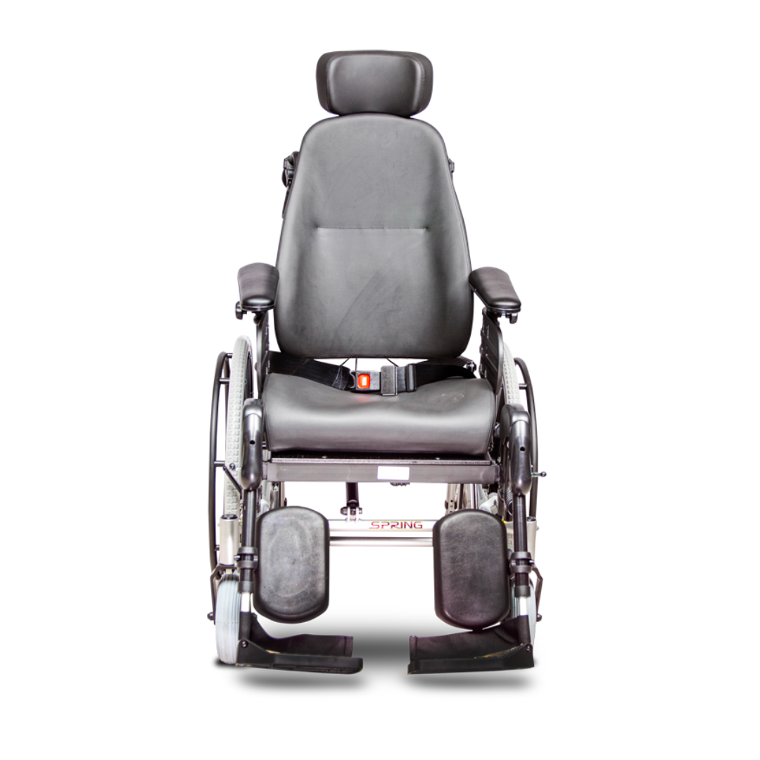 A front view of the Heartway Spring Tilt N Space Reclining Manual Wheelchair in black, featuring armrests, footrests, a headrest, and a seatbelt, photographed against a white background.