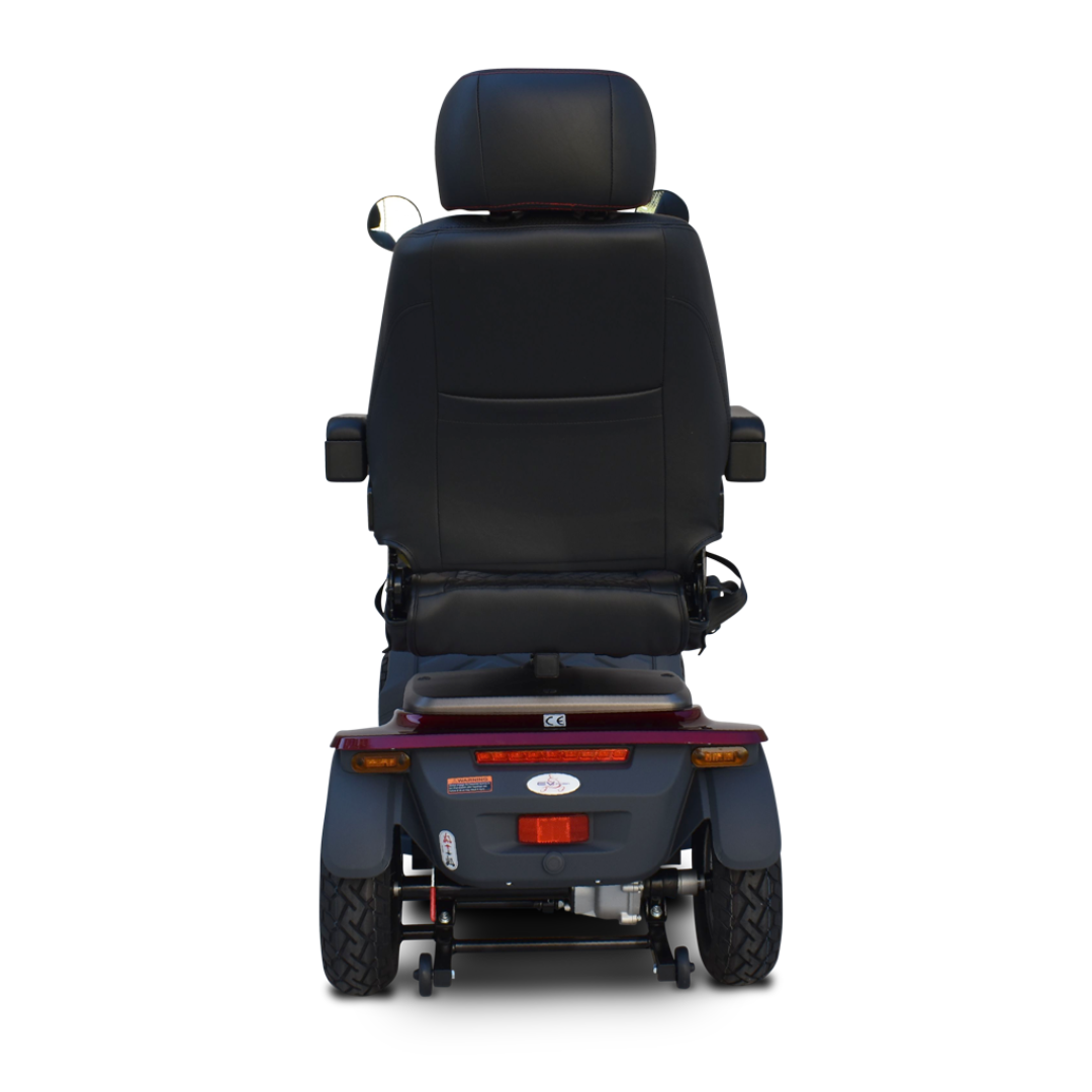 A Heartway VitaExpress Heavy Duty All-Terrain Scooter viewed from the rear, showing its black cushioned seat with armrests and headrest, rear lights, and thick tires, all set against a plain white background.