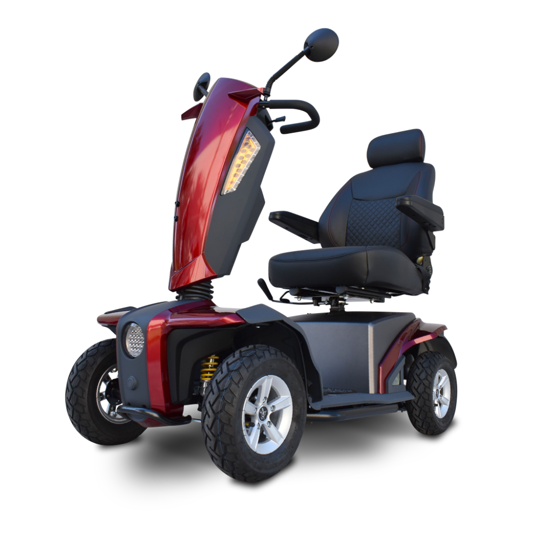 The Heartway VitaExpress Heavy Duty All-Terrain Scooter features four rugged wheels, a black cushioned seat with armrests, headlights, and a rear-view mirror, displayed against a white background.