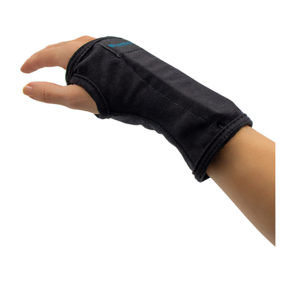 A hand and wrist wear the Heelbo Carpal Tunnel Wrist Brace (Universal Fit) in black, with the thumb extended through an opening for carpal tunnel relief against a plain white background.