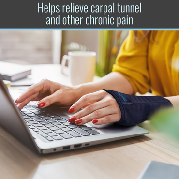 A person wearing a Heelbo Carpal Tunnel Wrist Brace - Fits Left & Right Hands types on a laptop at a desk. The text reads, "Helps relieve carpal tunnel and wrist pain." A coffee mug and potted plant are in the background.