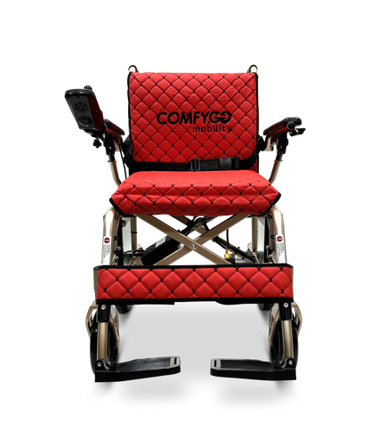 The ComfyGo X-7 Lightweight Foldable Electric Wheelchair, weighing just 40 lbs, features a red quilted design against a black backdrop with black armrests and control panel. It includes footrests and powerful motors, offering a portable solution for easy transport.