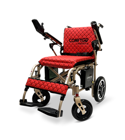 The ComfyGo X-7 is a red and black motorized wheelchair with quilted upholstery, powerful motors, joystick controller on the armrest, large rear wheels, and smaller front wheels. The brand Comfygomobility is displayed on the backrest, showcasing its innovative design.