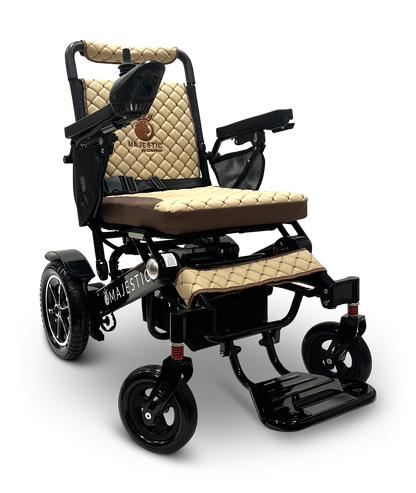 The MAJESTIC IQ-7000 Remote Controlled Electric Wheelchair features stylish beige quilted cushions, a sleek black frame, and comfortable armrests. Engineered for convenience, it includes rear wheels for effortless navigation and a lightweight build that suits those who are always on the move.