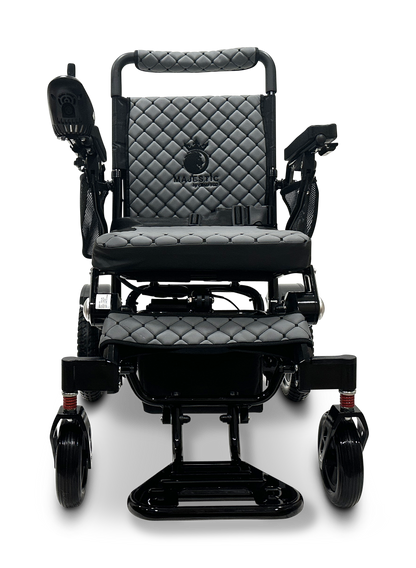 The MAJESTIC IQ-7000 Remote Controlled Electric Wheelchair in black features a sleek and modern design with a quilted leather seat and backrest. It includes a convenient joystick on the armrest and, despite its powerful motorization, remains impressively lightweight for easy mobility.