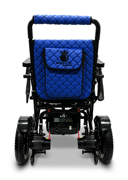 The image shows the back view of the MAJESTIC IQ-7000 Remote Controlled Electric Wheelchair in blue, featuring a quilted design with "Majestic" and a logo on the backrest. This lightweight wheelchair combines style and functionality with its sturdy black wheels and sleek metal frame.
