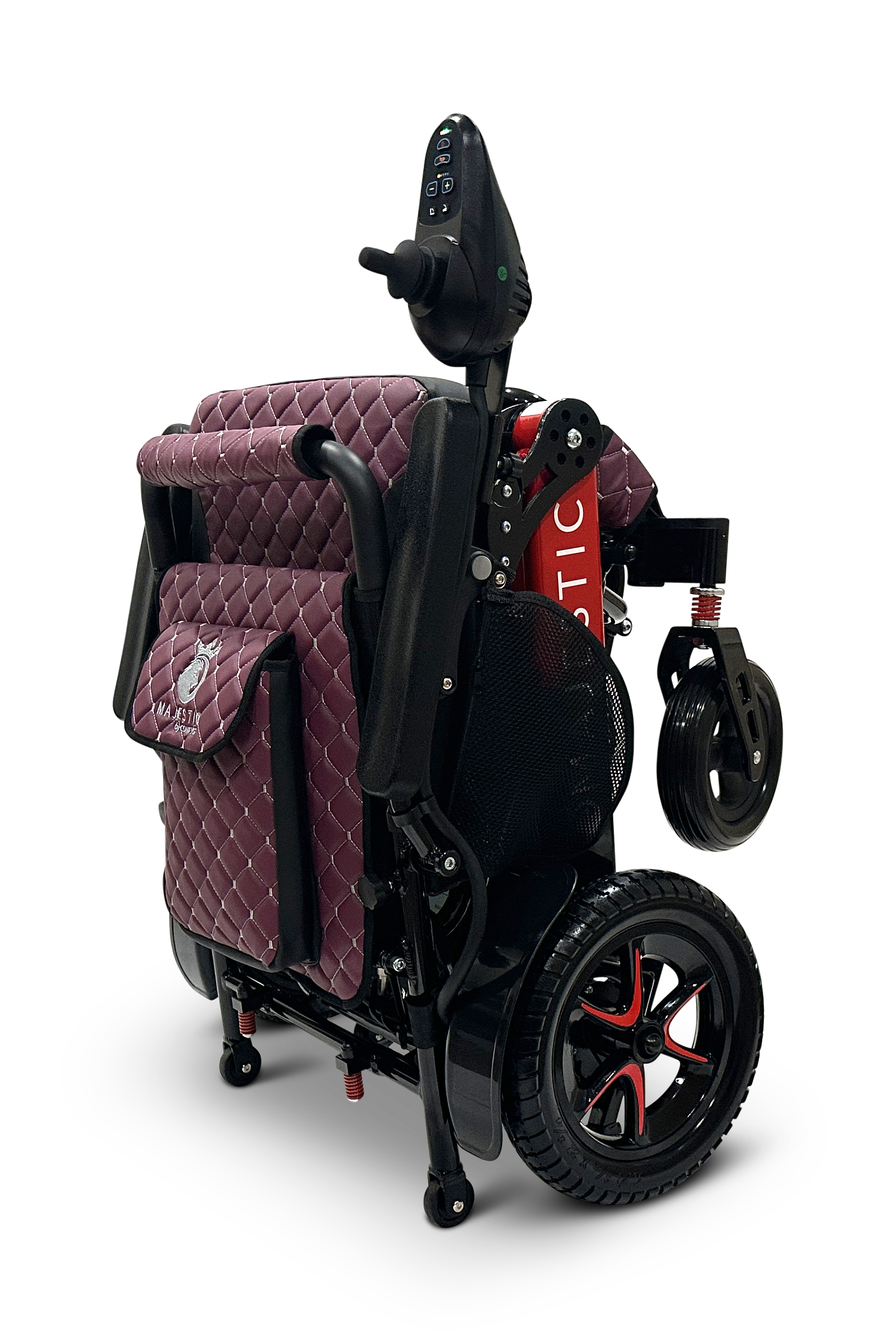 Showcased against a sleek black background is the MAJESTIC IQ-7000 Auto Folding Remote Controlled Electric Wheelchair, featuring a folded design in red and black with quilted maroon cushioning, an intelligent joystick, and sturdy black wheels accented in red.