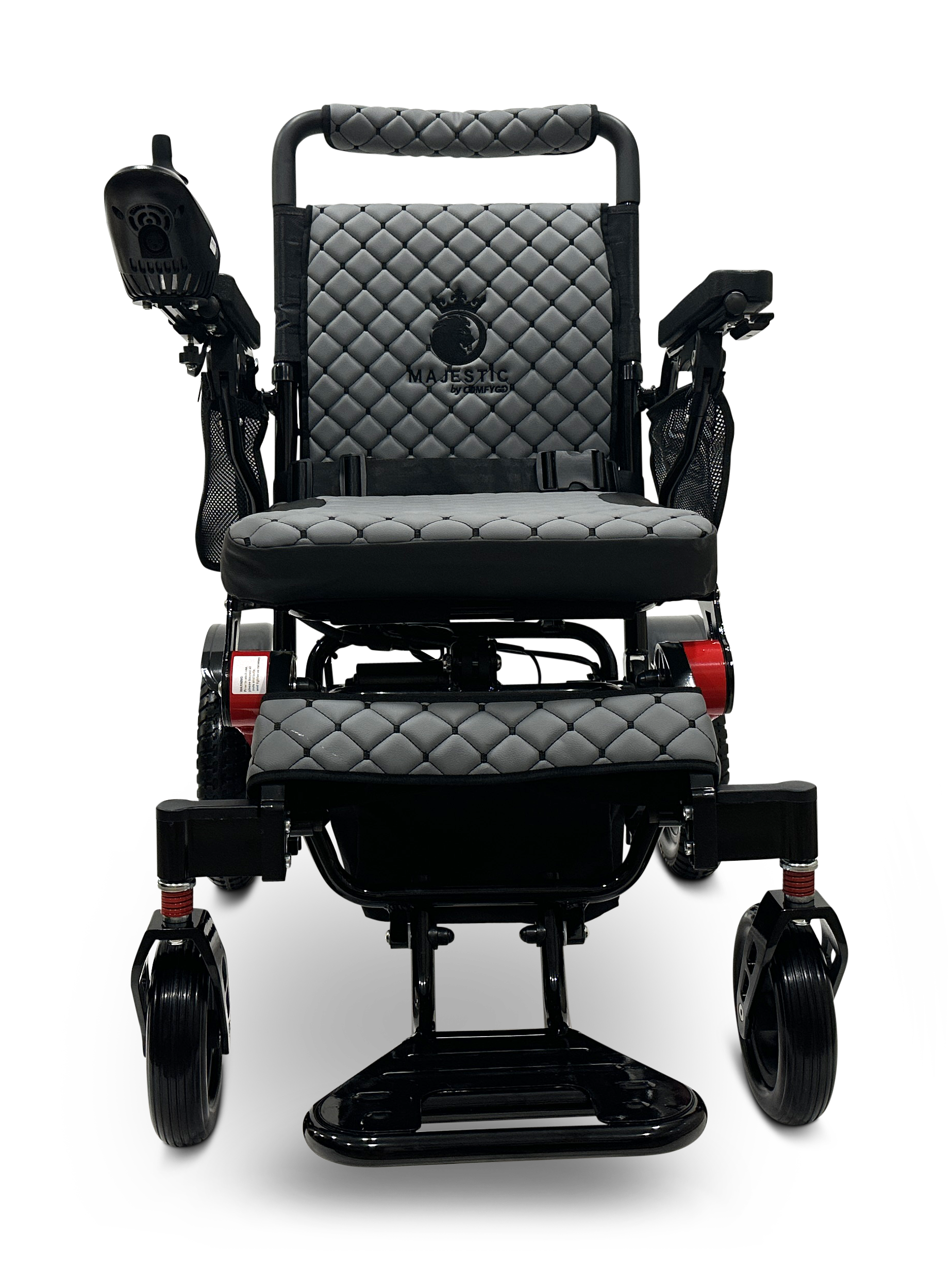 The MAJESTIC IQ-7000 Remote Controlled Electric Wheelchair is a sleek black model with an auto-folding feature and a quilted seat and backrest. It includes comfortable armrests, intelligent joystick control on the right side, and smaller front wheels. The brand logo is prominently displayed on the backrest.