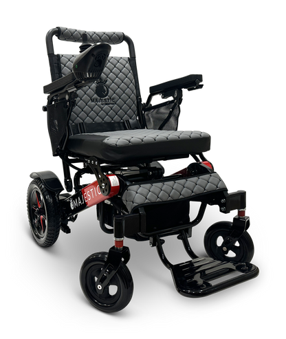 The MAJESTIC IQ-7000 Remote Controlled Electric Wheelchair in black and red features quilted upholstery, armrests, a cushioned seat, and large rear wheels. This lightweight model is ideal for those seeking comfort and style while on the move.