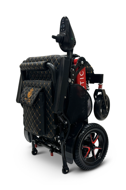The MAJESTIC IQ-7000 Remote Controlled Electric Wheelchair showcases quilted, diamond-patterned upholstery with black and red accents. It is equipped with an intelligent joystick controller on the armrest, and its compact, modern design ensures portability with visible wheels and handles.