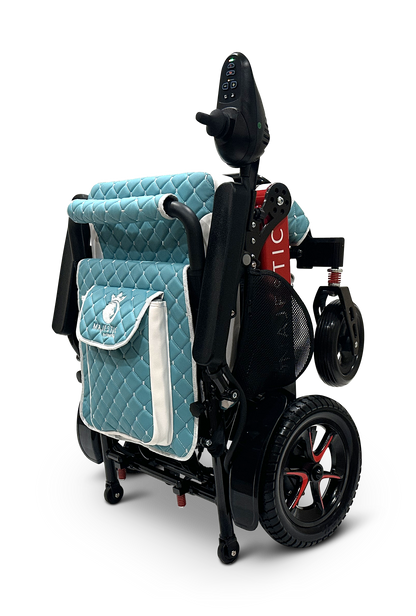 Introducing the MAJESTIC IQ-7000, a compact and lightweight electric wheelchair featuring teal and white quilted fabric, a sleek black frame, and wheels accented in red. Equipped with a control panel on the armrest, this stylish wheelchair also includes an auto-folding mechanism for effortless storage and a handy pocket on the back for convenience.