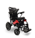 The ComfyGo MAJESTIC IQ-9000 Remote Controlled Electric Wheelchair is available in black and red, featuring a digital joystick controller with padded armrests, a cushioned seat, and footrests. It is equipped with brushless silent motors for smooth operation and has large rear wheels along with smaller front wheels for improved accessibility and comfort.