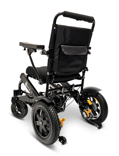 The ComfyGo MAJESTIC IQ-9000 Auto Reclining Electric Wheelchair, shown from the back, features a black foldable design with large rear wheels, padded seat and backrest, rear pocket, small front casters, and a durable aluminum alloy frame.