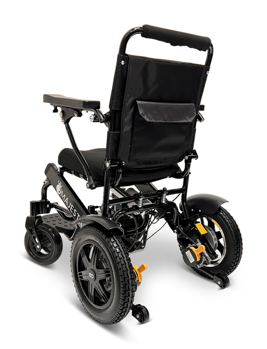 The ComfyGo MAJESTIC IQ-9000 Auto Folding Electric Wheelchair is a sleek black motorized wheelchair, visible from the back. It boasts thick tires and a cushioned seat, as well as a digital joystick controller and brushless silent motors to ensure smooth operation. Equipped with armrests and a storage pocket, it is thoughtfully designed for optimal mobility assistance.