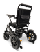 The ComfyGo MAJESTIC IQ-9000 Auto Folding Electric Wheelchair is a sleek black motorized wheelchair, visible from the back. It boasts thick tires and a cushioned seat, as well as a digital joystick controller and brushless silent motors to ensure smooth operation. Equipped with armrests and a storage pocket, it is thoughtfully designed for optimal mobility assistance.