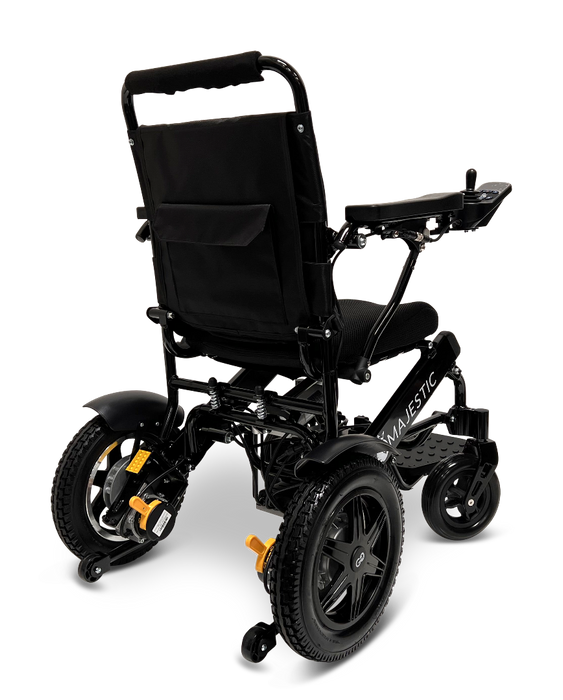 The ComfyGo MAJESTIC IQ-9000 Auto Folding Electric Wheelchair is a stylish, black mobility device with a digital joystick controller for precise navigation. It includes a cushioned seat and backrest, robust rear wheels powered by brushless silent motors, and smaller front wheels. The wheelchair also features armrests and a storage pocket on the back.