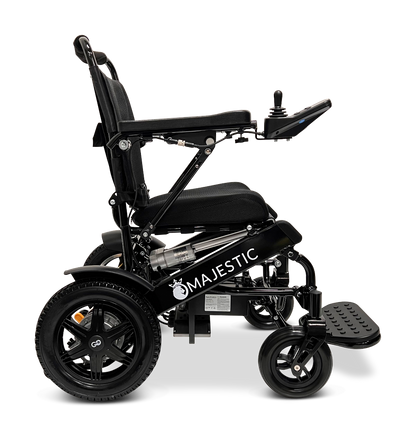 The ComfyGo MAJESTIC IQ-9000 Auto Reclining Electric Wheelchair in black features a side view, cushioned seat, digital joystick control, large rear and small front wheels, aircraft-grade aluminum alloy frame, and MAJESTIC branding.