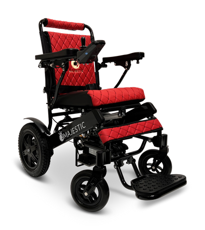 The ComfyGo MAJESTIC IQ-9000 Auto Reclining Electric Wheelchair features a black frame, red diamond-stitched seat and backrest, armrests, large rear wheels, foldable footrest, brushless silent motors, and aircraft-grade aluminum alloy build.