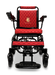 The ComfyGo MAJESTIC IQ-9000 Auto Folding Electric Wheelchair, designed in red and black with a quilted pattern and a gold logo on the backrest, includes armrests and a footplate. It features brushless silent motors and is equipped with an IQ-9000 AR digital joystick controller, showcased from the front against a black background.