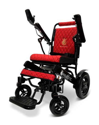 The ComfyGo MAJESTIC IQ-9000 Auto Reclining Electric Wheelchair features a black aircraft-grade aluminum alloy frame, padded red quilted seat and backrest with Majestic logo, footrest, and a digital joystick controller on the armrest.