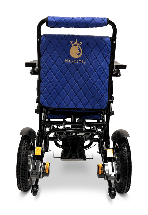 Rear view of a ComfyGo MAJESTIC IQ-9000 Auto Folding Electric Wheelchair, showcasing a quilted blue backrest adorned with a gold crown logo. This model features brushless silent motors and large rear wheels, with expertly designed mechanical components for optimal performance.