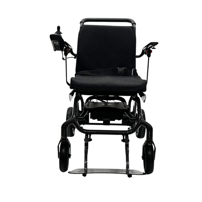 A front view of the ComfyGo IQ-Carbon Lightweight Carbon Fiber Electric Wheelchair, featuring a joystick on the right armrest, padded seat, and footrest, shown on a white background.