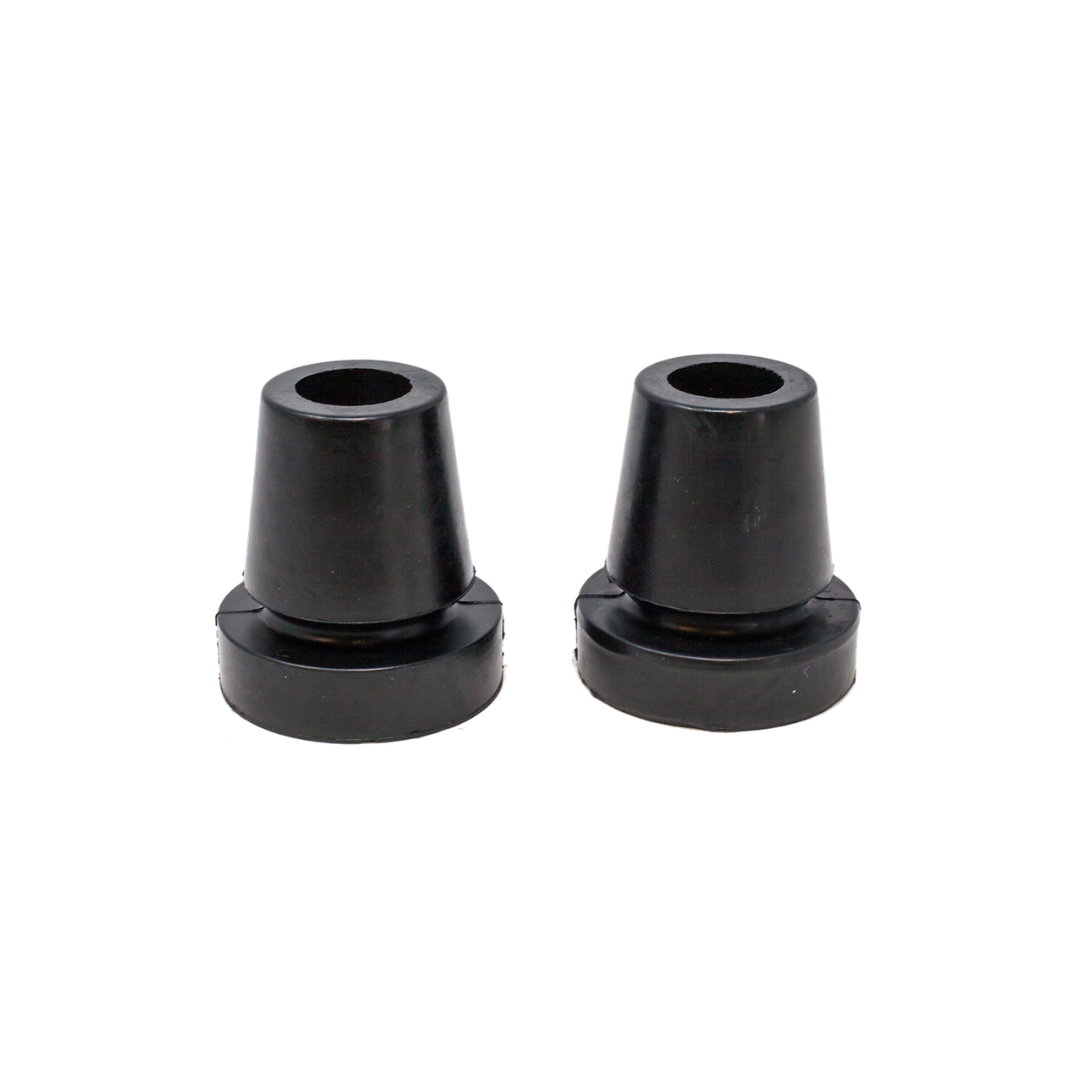 Two black rubber conical stoppers with central holes sit side by side on a white background—ideal as replacement tips for the Millennial Medical In-Motion Pro Underarm Folding Crutch Set.