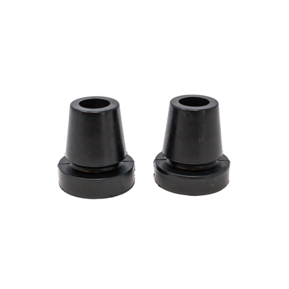 Two black rubber conical stoppers with central holes sit side by side on a white background—ideal as replacement tips for the Millennial Medical In-Motion Pro Underarm Folding Crutch Set.