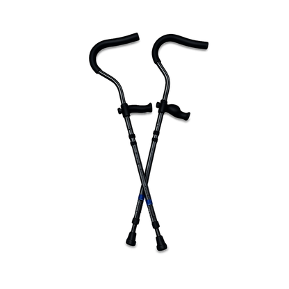 The Millennial Medical In-Motion Pro Underarm Folding Crutch Set in black, featuring ergonomic handles and rubber tips, is shown crossed against a white background.