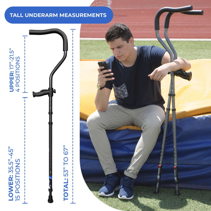 Outdoors, a young man sits on a high jump mat checking his phone, with two Millennial Medical In-Motion Pro Underarm Folding Crutches by his side. To the left is a diagram displaying adjustable crutch settings for different heights.