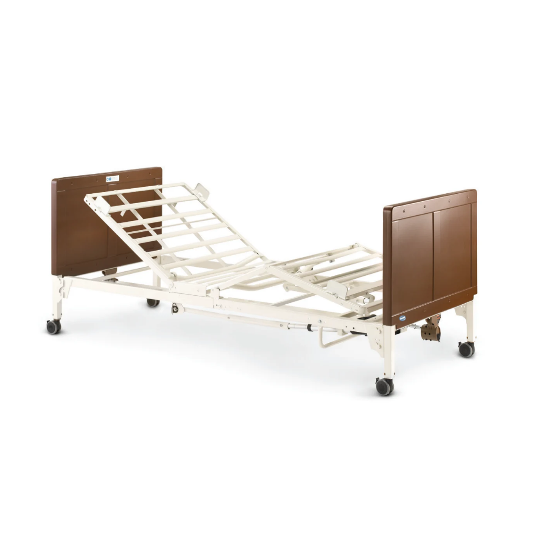 Invacare G-Series Bariatric Full Electric Hospital Bed G5510 with an adjustable metal frame and brown head and foot boards on wheels.