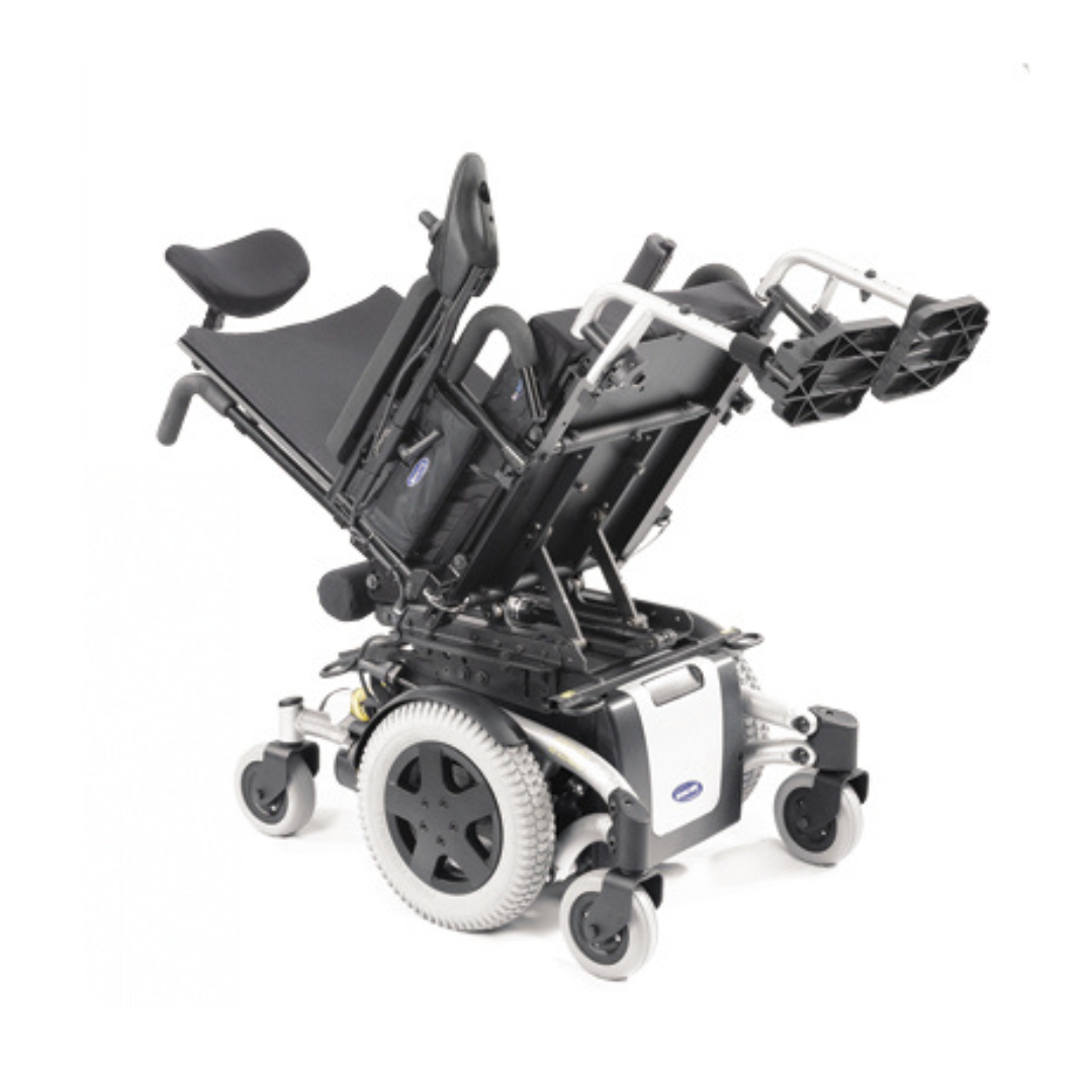 The Invacare TDX SP2 Power Wheelchair with Tilt, Recline & Seat Elevation in black and silver features adjustable seat and leg supports for enhanced mobility, shown with its seat tilted back against a plain white background.
