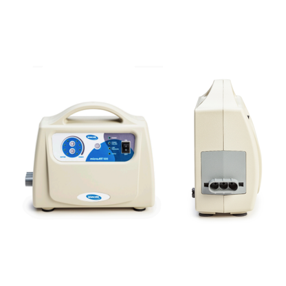 A beige Invacare microAIR® MA500 Alternating Pressure Low Air Loss Mattress System is shown from the front and side, featuring a control panel with buttons, a dial, display screen on the front, and side ports for optimal pressure relief.