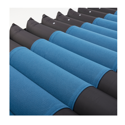 Close-up of alternating blue and black air tubes on the Invacare microAIR® MA600 3-in-1 Alternating Pressure LAL Mattress System, designed for pressure relief and support in medical care.