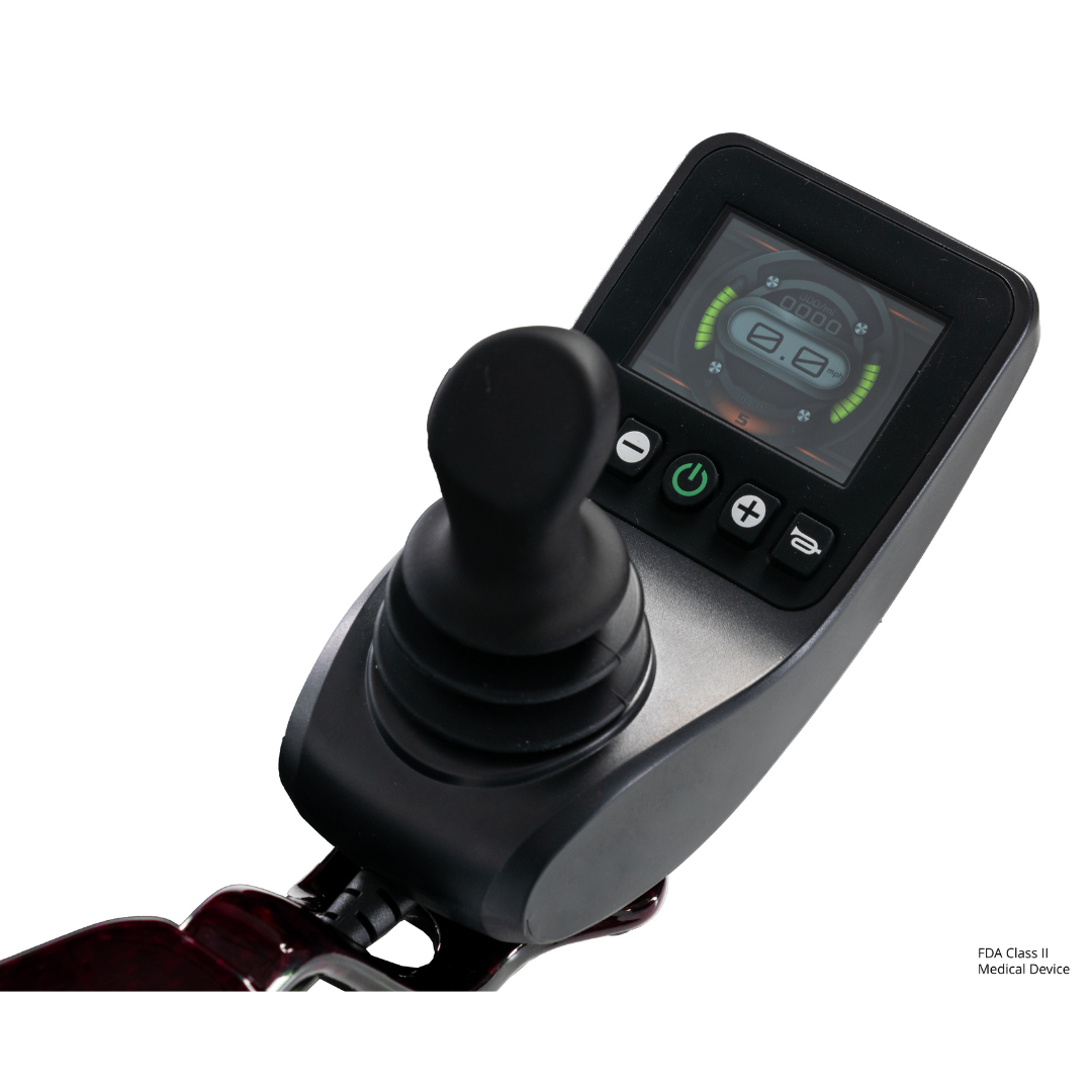 Close-up of the Pride Jazzy Carbon HD Bariatric Portable Powerchair’s black joystick controller, featuring a digital display for battery and speed, plus control buttons—designed for this lightweight travel power chair.