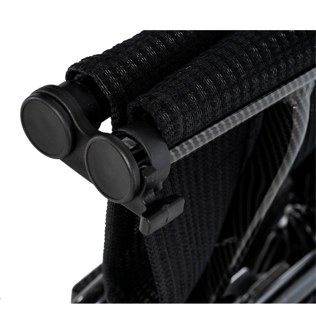 Close-up of the folded backrest and push handles on the black Pride Jazzy® Carbon 27X Portable Power Wheelchair, showcasing its textured fabric and tubular ultra-lightweight frame details.
