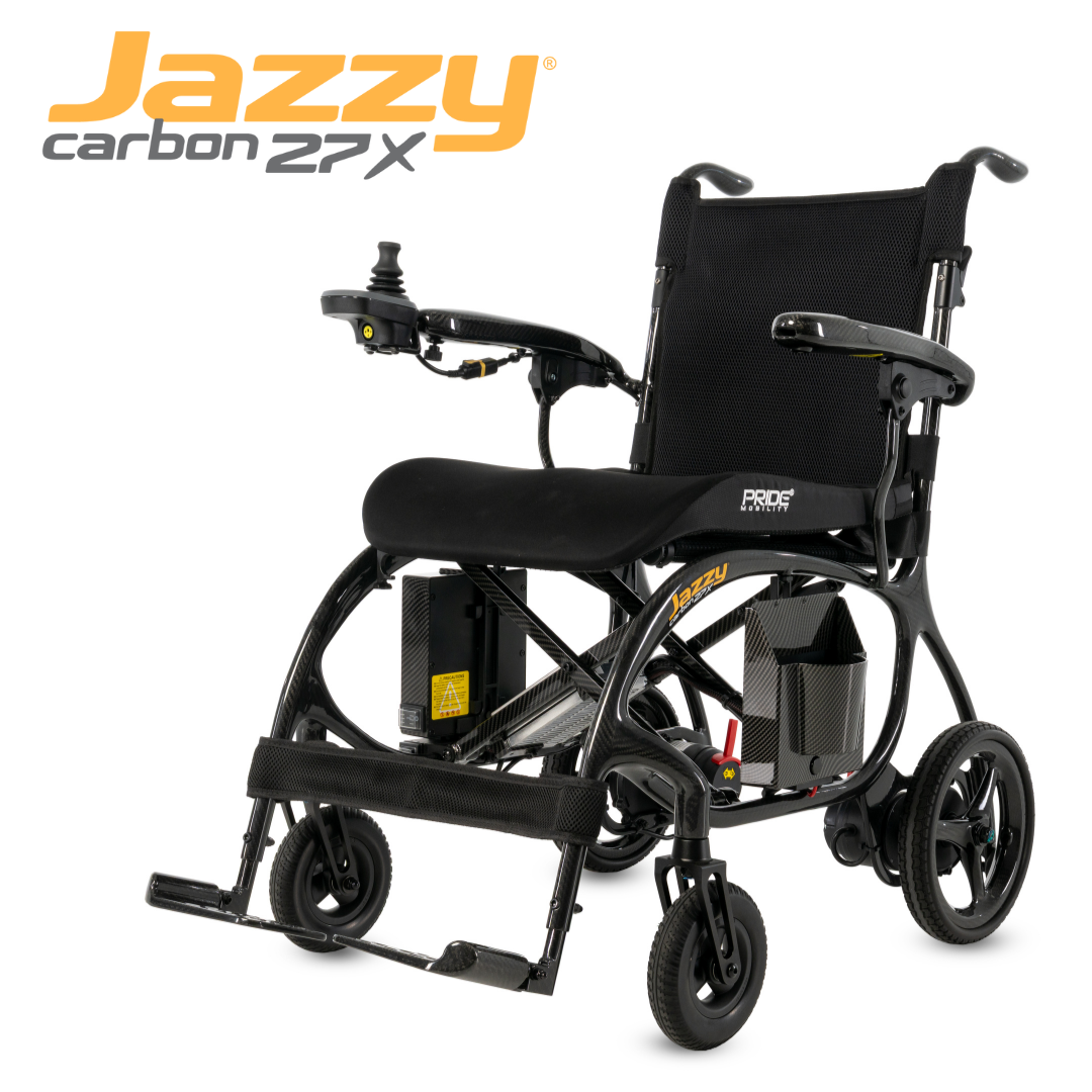 The Pride Jazzy® Carbon 27X Portable Power Wheelchair is a black carbon fiber chair with a right-armrest joystick controller, highlighting its ultra-lightweight, sleek design against a white background.