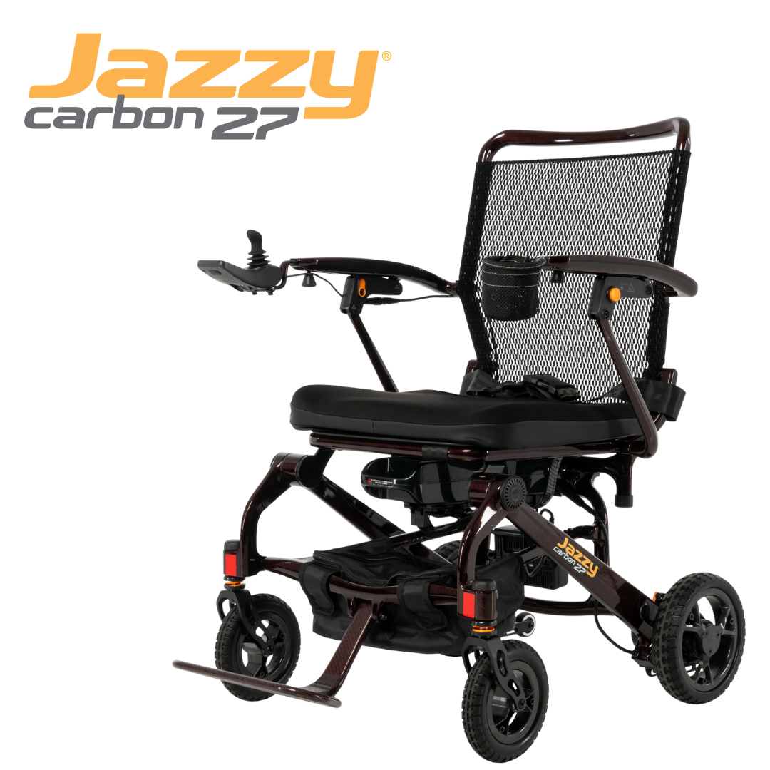 A lightweight, black Jazzy® Carbon 27 Ultralite Portable Power Wheelchair with mesh backrest, armrests, footrest, joystick control, and small wheels. The product logo appears in the top left corner.