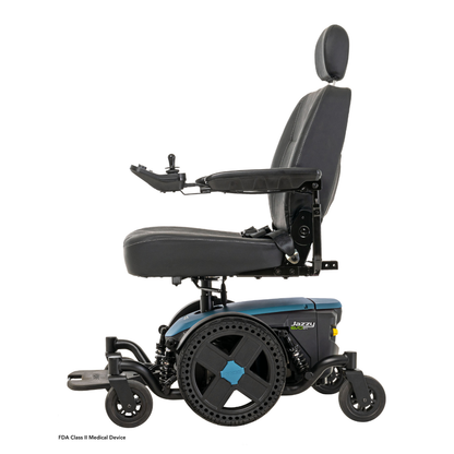 A side view of the black and blue Pride Mobility Jazzy® EVO 614 HD Bariatric Powerchair with ATX Suspension, featuring a padded seat, backrest, headrest, joystick-controlled adjustable armrests, large rear wheels, and heavy-duty mobility support.