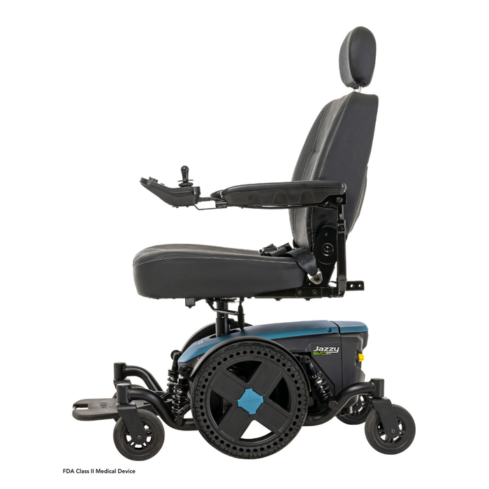 A side view of the black and blue Pride Mobility Jazzy® EVO 614 HD Bariatric Powerchair with ATX Suspension, featuring a padded seat, backrest, headrest, joystick-controlled adjustable armrests, large rear wheels, and heavy-duty mobility support.