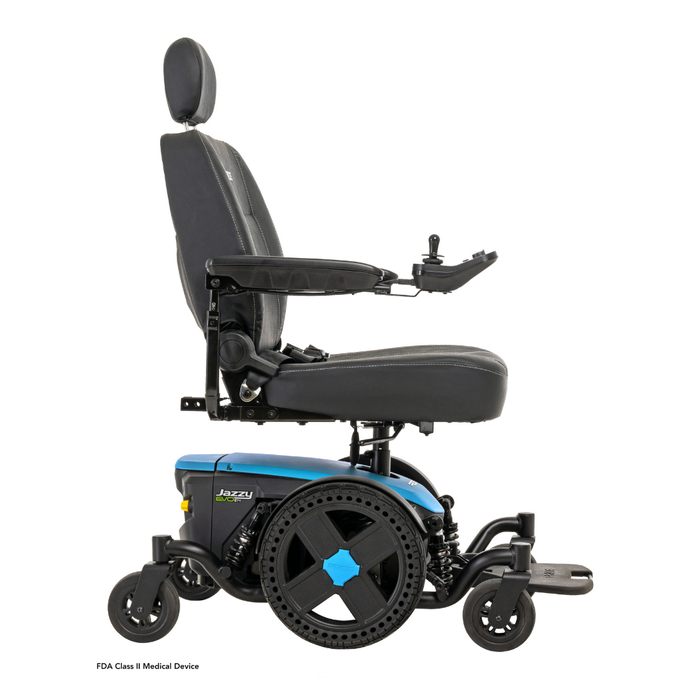 A side view of the Pride Mobility Jazzy® EVO 614 HD Bariatric Powerchair with ATX Suspension in blue and black, featuring a cushioned seat, headrest, armrests, joystick controller, and four wheels against a white background.