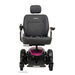 Front view of the Pride Mobility Jazzy® EVO 614 HD Bariatric Powerchair with ATX Suspension, magenta base, left-side joystick, armrests, Pride logo on headrest, and four wheels; a heavy-duty mobility chair.